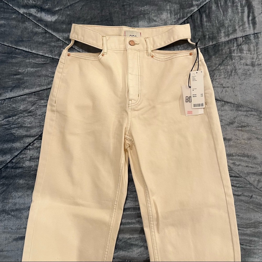 white cut out jeans